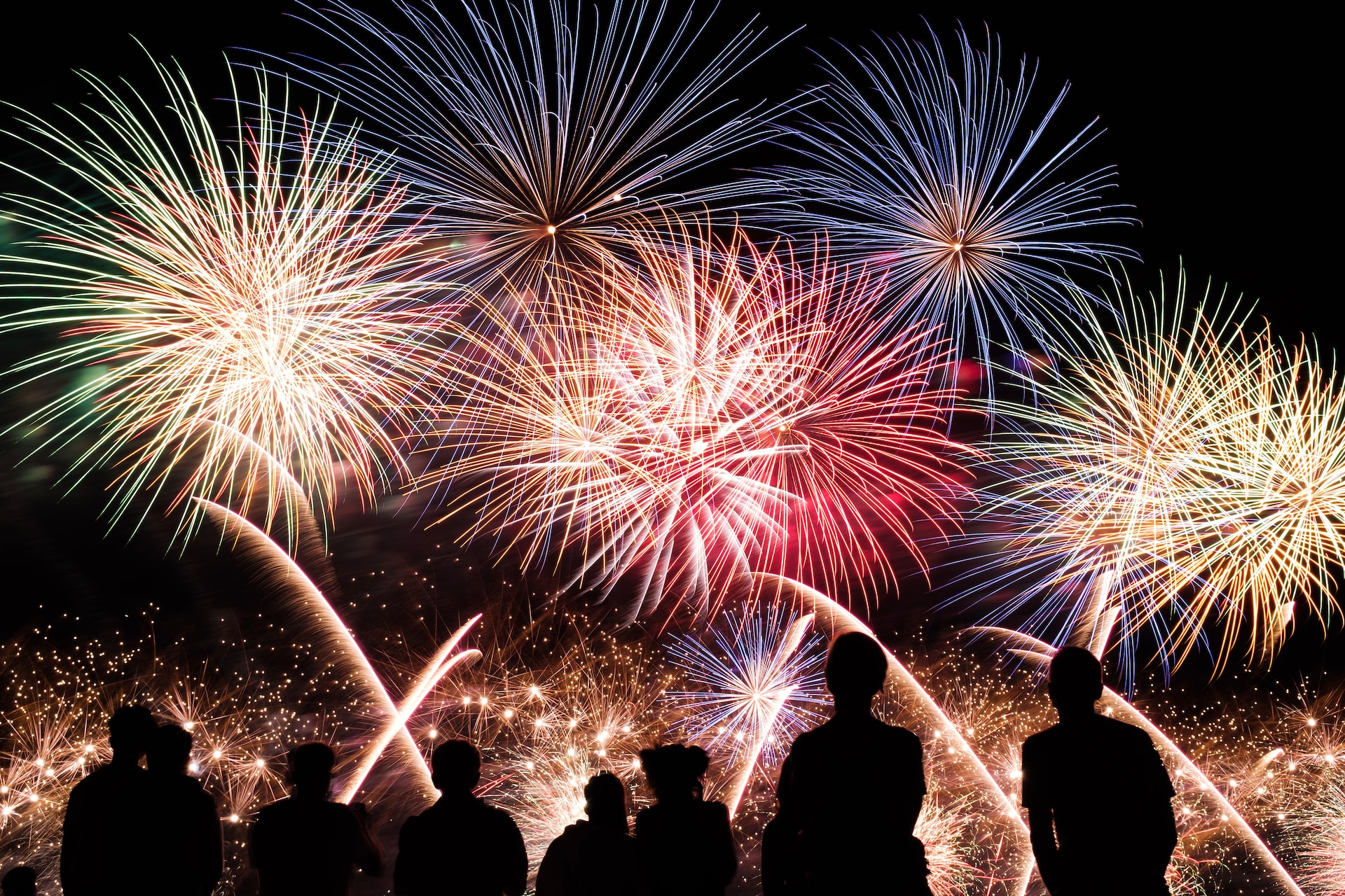 Fireworks with a silhouette of an audience